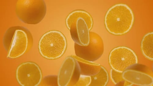 Bright Oranges Floating on an Orange Background
