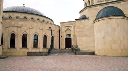 Wooden doors for the entrance to Muslim mosque for prayers of people of the faith of Islam