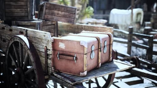 Old Travel Trunks on Rustic Wooden Wagon Loop