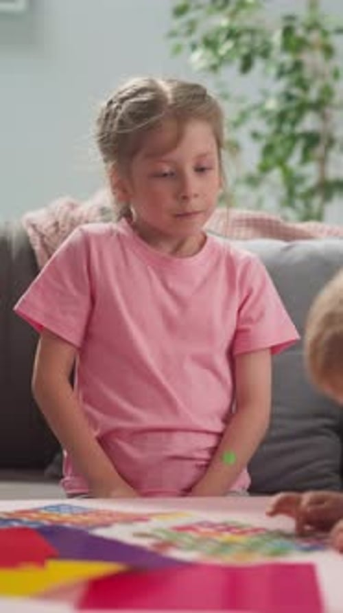 Children Play with Geometric Shapes at Home