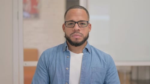 Portrait of Serious African Man in Office