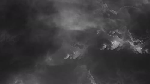 thunder rumbled within the thick gray clouds.