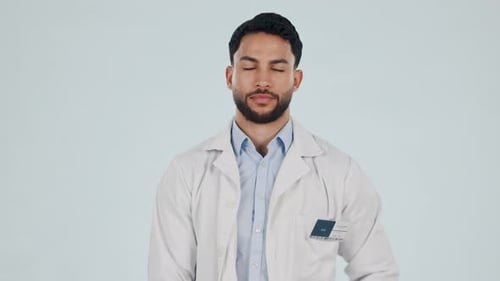 Happy man, face and ok sign of doctor in studio for success, healthcare feedback