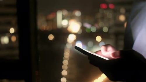 Phone Use at Night in City