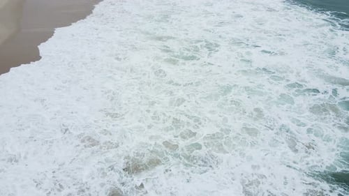 Aerial Drone View Over Beautiful Blue Waves Pattern of Atlantic Ocean and Sea Foam Landscapes View