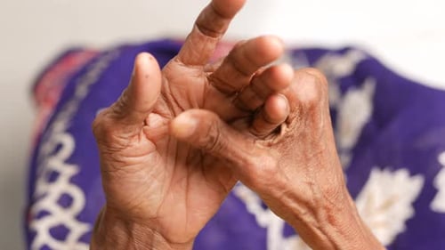 Elderly Woman Suffering From Pain Top View