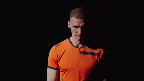 Close Up of Man in Orange T-Shirt