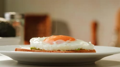 Fried Egg and Avocado on Toast for Breakfast