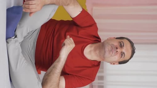 Vertical video of Sick man with rapid breathing. The man cannot control his breathing.