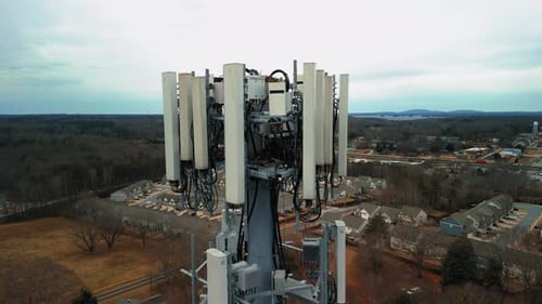Cinematic Drone Footage Slowly Approaching a Cell Phone Tower in Close Up Detail