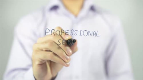 Hand Writes Professional Service with Marker