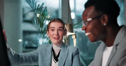 Computer, high five and success with business people in office together at night for celebration