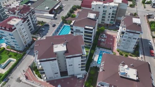 Aerial View Beautiful Complex With an Azure Pool and Water Slides for Kids By the Sea