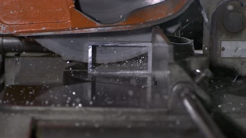circular saw cutting a aluminium shaped pipe in super slow motion 800 fps