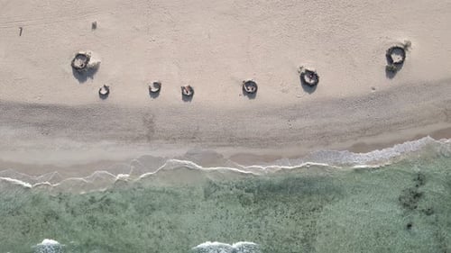 White sand beach shore top view aerial