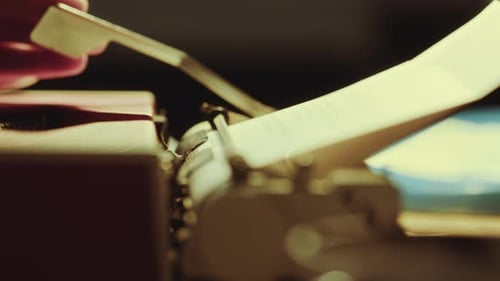 Hands of Unrecognizable Writer Typing on Typewriter at Desk