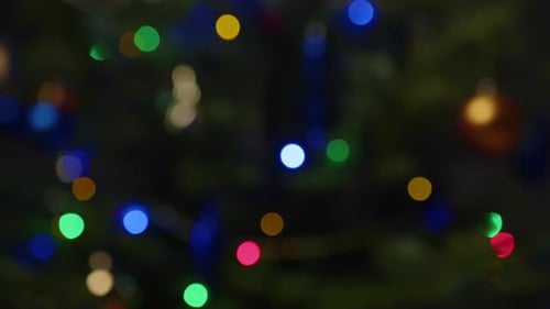 Blurred Blinking Christmas Lights Flares Out of Focus