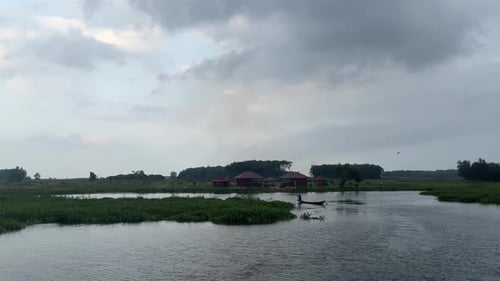 a fisherman in a lake who is going to catch fish.