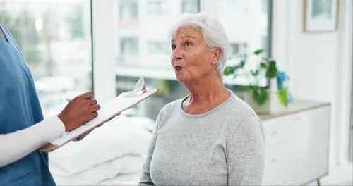 Checklist, writing or doctor with old woman in consultation for healthcare history in hospital