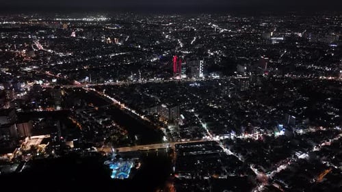 A panoramic view of high-rise buildings in downtown Ho Chi Minh City at night | Saigon Vietnam