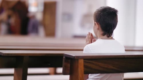 Sacred Reflections A Serene Moment of Prayer and Reverence in the Church