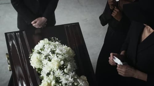 Mournful People at a Funeral