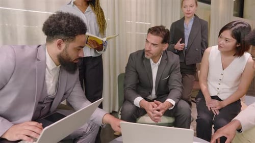 Business Team Collaborates in Modern Office