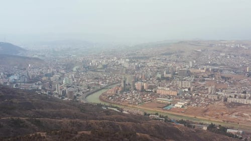 Aerial panorama of Tbilisi, Georgia. 4k footage. Pan to the left.