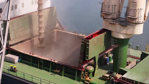 Wheat Loading to Bulker Ship Cargo Container at Sea Grain Terminal in Seaport Grain Shipment From