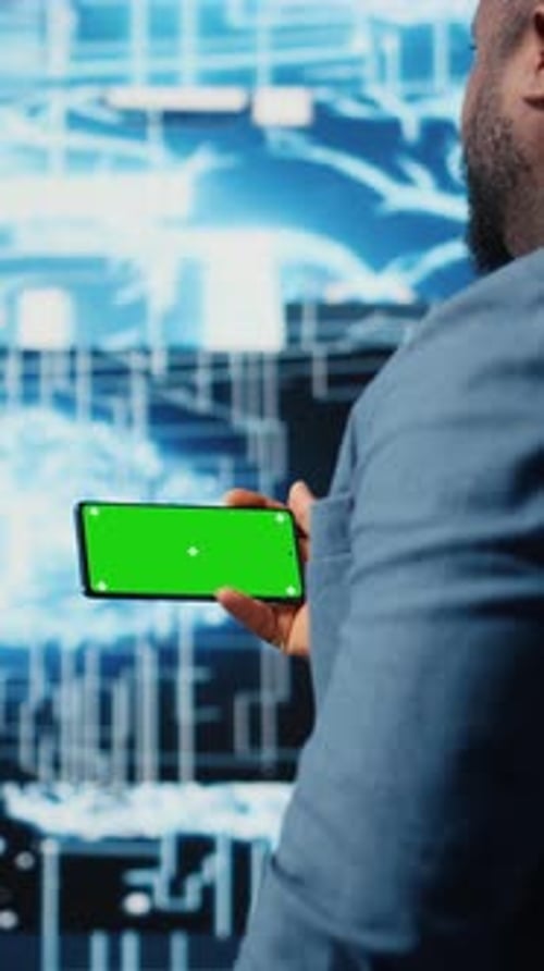 Vertical Video IT Engineer in a High Tech Space Uses Copy Space Display with AI Modern Tools