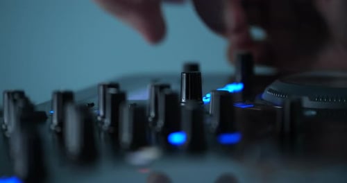Close up of DJ on decks