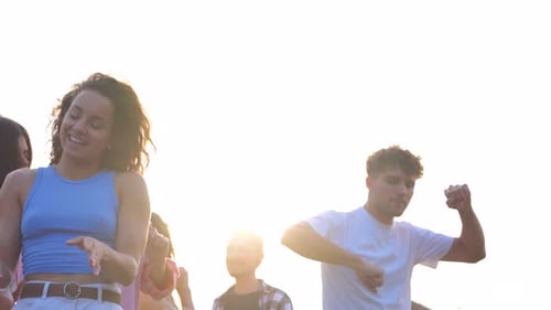 Group of Friends Dancing Outdoors