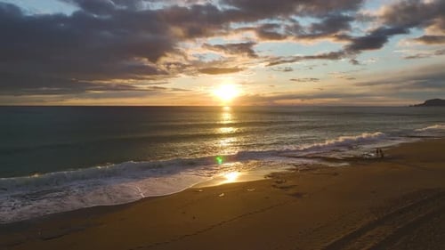 Beautiful Golden Sunset Aerial Over Sandy Beach