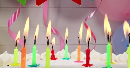 Festive Cake with Candles and Decorations