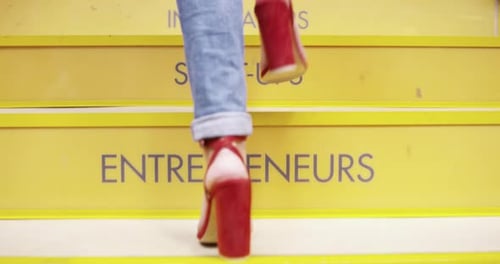 Feet, office stairs and closeup for woman with motivation, inspiration and signage with words