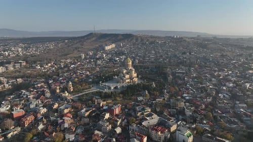 Drone view of Tbilisi city center featuring the Sameba Holy Trinity Cathedral, Georgia.