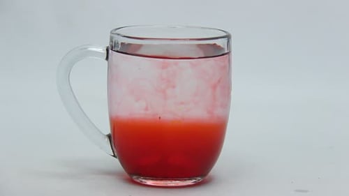 Mixing Colors in Mug with Straw