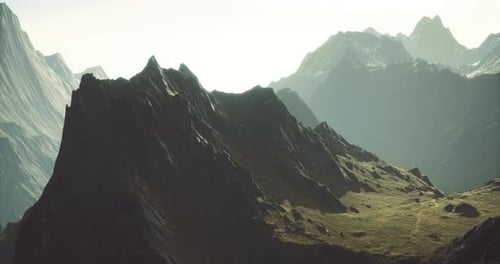 Stunning Mountain Landscape with Peaks and Grassy Valleys During Daylight