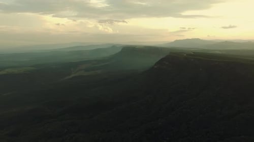 Arial Drone of Mountain Canyon/Mountain Range at Sunset