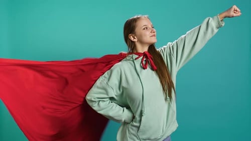 Portrait of Jolly Girl Wearing Superhero Costume for Halloween