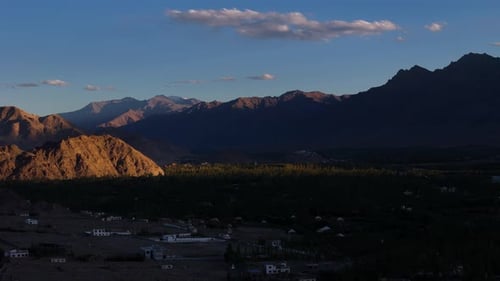 Aerial drone shot of orange mountains captured during sunset in ladakh