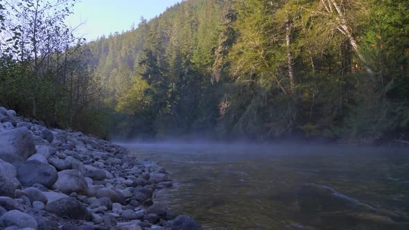 Hot Spring Stream In Forest Mountains During Sunny Day. Wide Shot ...