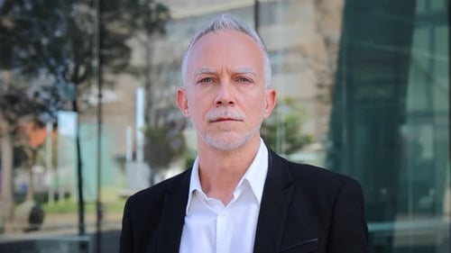 Close Up Portrait of a Mature Serious Business Man with Aexecutive Suit Gray Hair and Successful