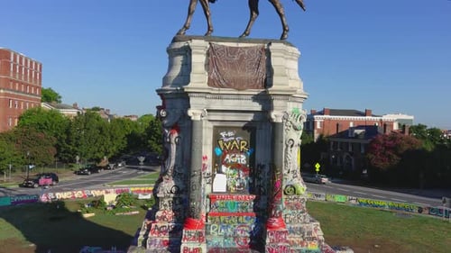 Drone shot of the Robert E. Lee Statue in Richmond Virginia on Monument ave. The statue has differen
