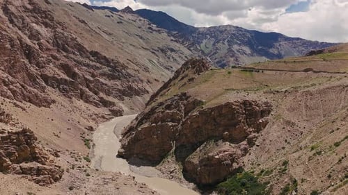 Aerial View of Desert Canyon with River in Himalayas