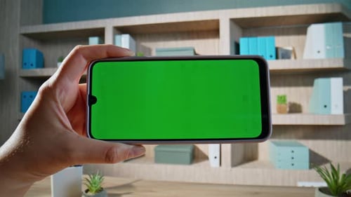 Woman Hands Interacting Chroma Key Smartphone at Office Interior Closeup