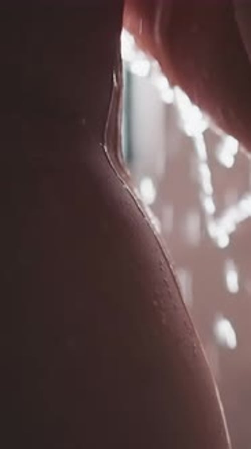 Water Cascading Down Body in the Shower