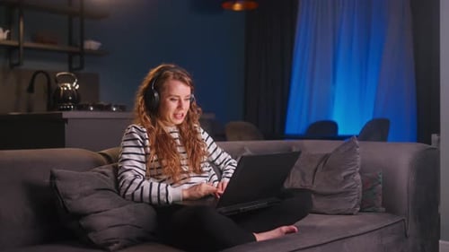 Customer Support Service Call Center Manager Speaking Working From Home Curly Woman with Headset