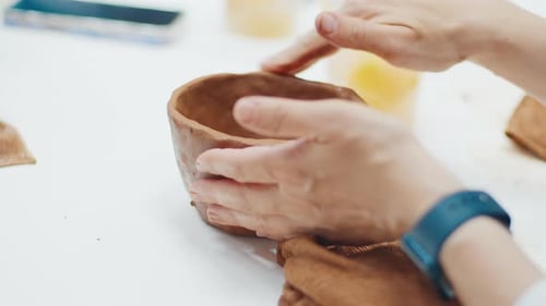 Person Works with the Clay in the Pottery Workshop During Masterclass