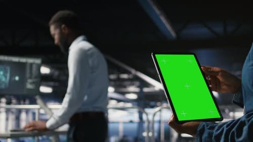 Close Up of Server Hub Admin Using Isolated Screen Tablet Next to Colleague